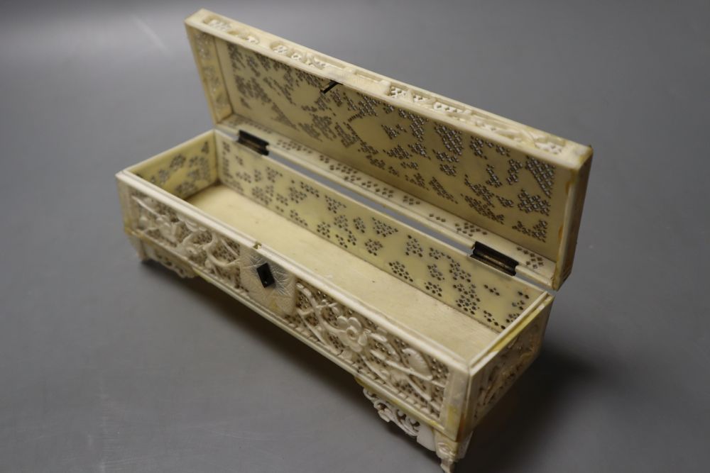 A 19th century Chinese ivory box, with finely carved and pierced detail, 18.5cm